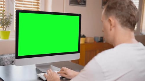 Caucasian Businessman Working on Computer
