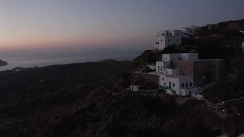 Aerial Perspective of Little Village on Milos Island, Greece After Sunset with Ocean View