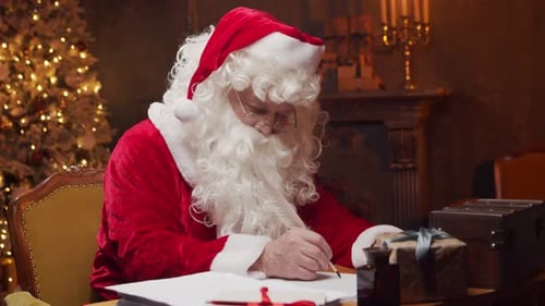 Santa Writing at Desk with Christmas Tree