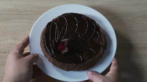 Chocolate Cake with Icing on a Plate