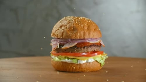White Sesame Seed Falling Into Bun in Slow Motion, Bun with Sesame for Making Hamburger