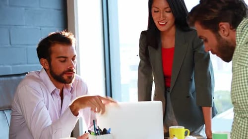 Business Team Collaborating in Modern Office Environment