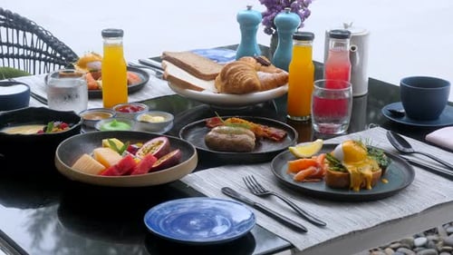Hotel Breakfast with Fresh Benedict Eggs Salmon Fruits and Freshly Juices