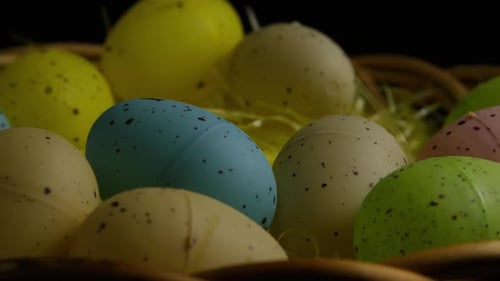 Colorful Easter Eggs in Wicker Basket Close Up