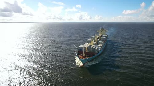 Aerial View of Container Ship Sailing in the Sea