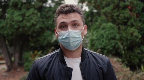 Man Wearing Surgical Mask Outdoors
