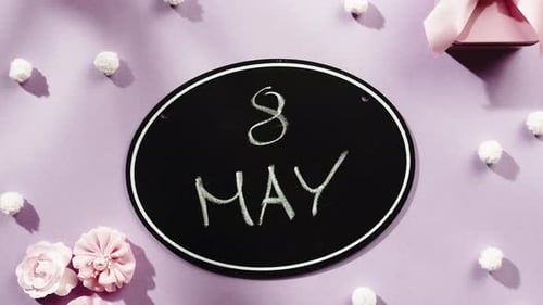 Close up Chalkboard with Eight May Greeting
