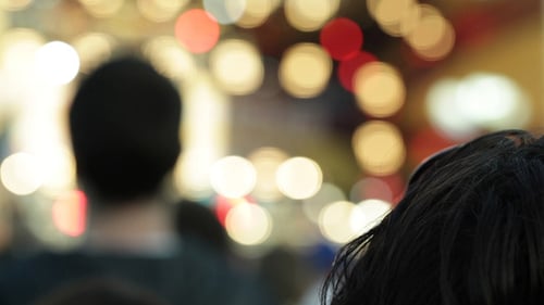 Crowd with Bokeh Lights at Night