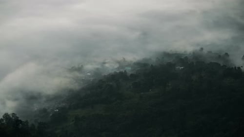 Fog Covered Village In Mountain