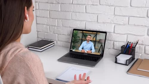 Woman Participates in an Online Video Call