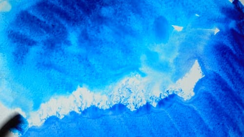 Bright Blue Paint Brush Strokes on White Surface