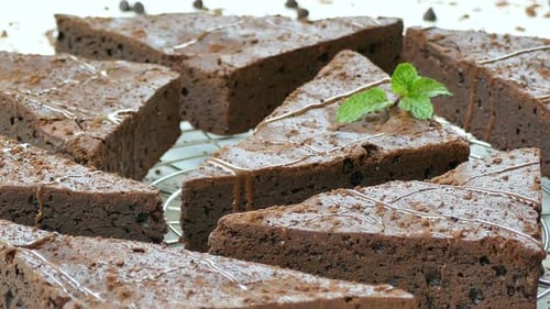Freshly Baked Chocolate Brownies with Drizzle and Mint