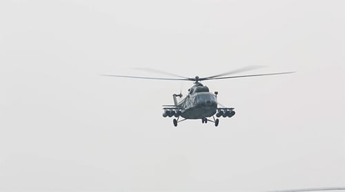 Military Helicopter Flying in the Sky