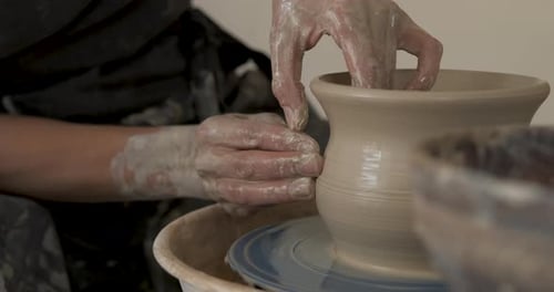 Close Up of Pottery Artist at Work Potter Master Creating Clay Pot on a Wheel