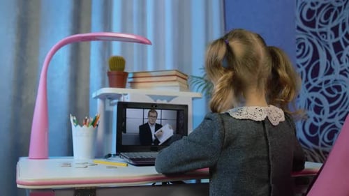 Child Learning Online Using Laptop at Home