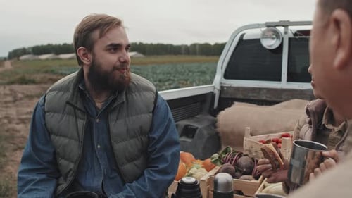 Farmers Discuss Harvest at Tailgate