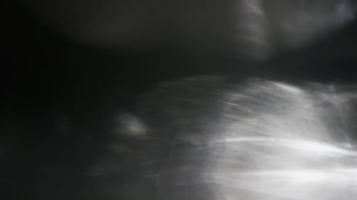 Abstract Light Patterns Against Dark Backdrop