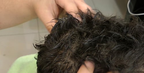 Man Receiving a Calming Head Massage