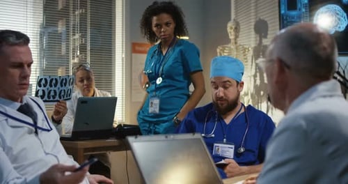 Medical Professionals Collaborating in Hospital Office