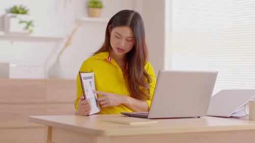 Young Woman Presenting Data During Video Call