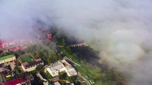 High Fog in the City in the Morning. The Small Town Is Covered in Dense Fog. Aerial View