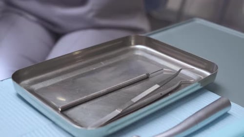 Dental Instruments on Metal Tray in Medical Office