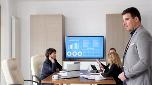 Smiling Business Leader Poses in Modern Office
