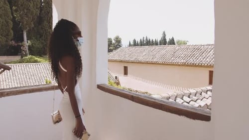 Young Woman Suing Smartphone At Alhambra Palace