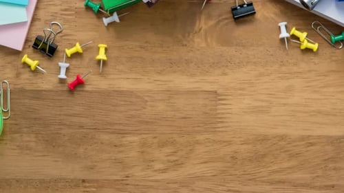 Education background concept top view with notebook and stationery on wood table