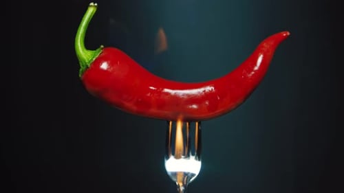 Red Chili Pepper on Fire on a Fork