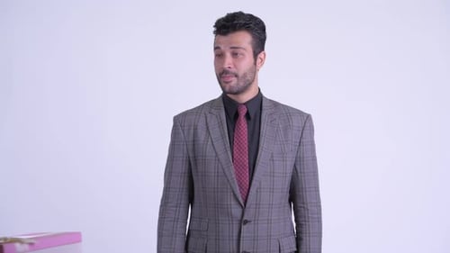 Well Dressed Man Receives Gift for Birthday