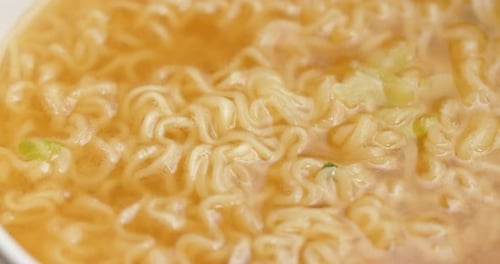 Close-up of Steaming Bowl of Delicious Ramen
