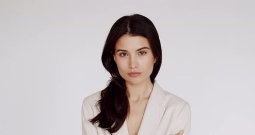 Woman Styles Hair in Close Up Portrait