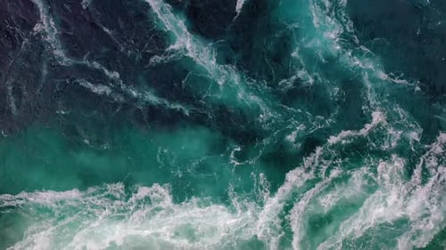Waves of Water of the River and the Sea Meet Each Other During High Tide and Low Tide.