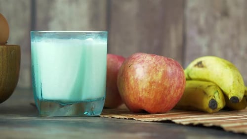 Fresh Fruits, Milk, and Eggs for Healthy Breakfast