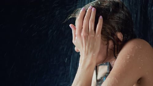 Woman Enjoying a Shower, Close Up