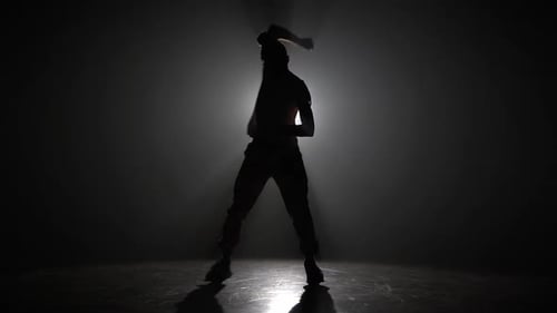 Silhouette Young Man Dancing Single in Club, Neon Light, Lots of Smoke. Fashion Street Wear