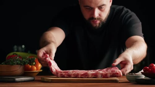 Man Chef Cooking Ribs Closeup