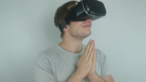Man Using Virtual Reality Headset Indoors