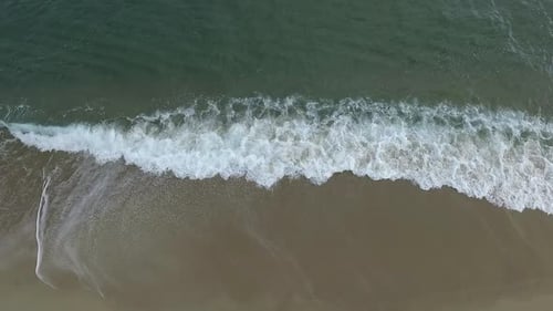 Aerial Drone View of Tropical Beach Ocean Waves Reaching Shore
