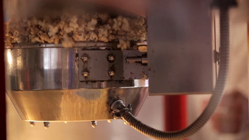 Close Up of Popcorn Machine Popping Snack
