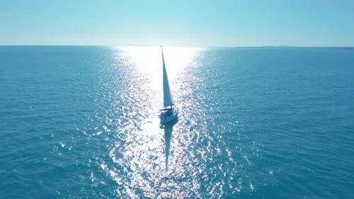Aerial View. Traditional Yacht Sailing Across Sea.