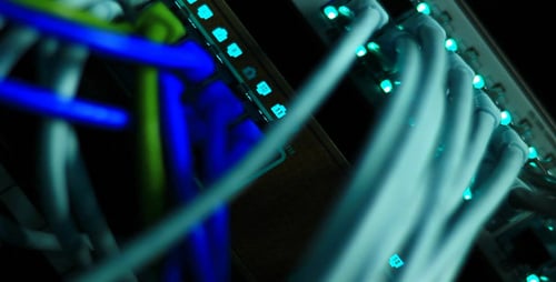 Illuminated Network Cables in a Server Room
