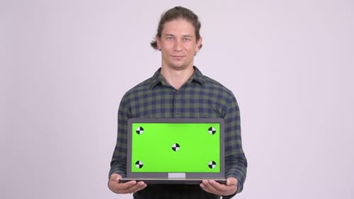 Man Holding Laptop With Green Screen Chroma Key