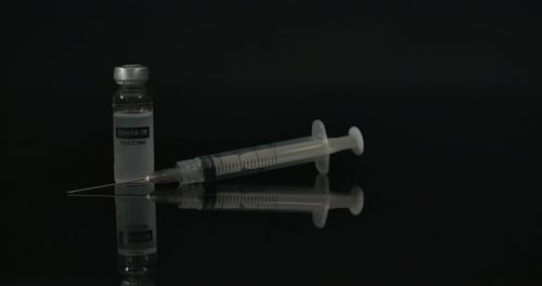 Covid-19 Vaccine Vial and Syringe