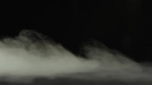 Hand Making Symbols in Fog