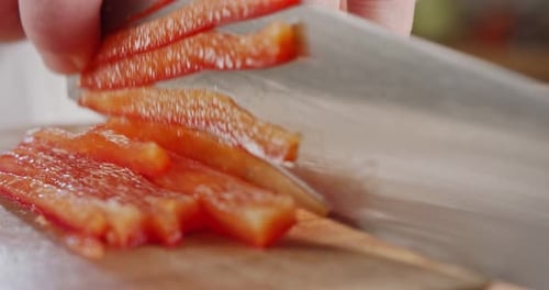 Close Up of Slicing Red Bell Pepper
