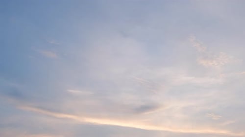Clouds Moving in Pink and Blue Sky