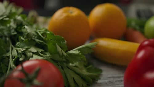 Fresh Vegetables and Fruit Displayed on Wood