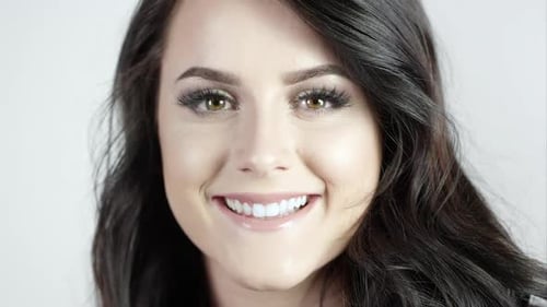 View of attractive young woman smiling